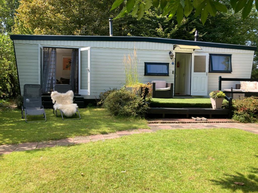 Вилла Charmant Chalet Op Een Bospark Op De Veluwe Пюттен Экстерьер фото